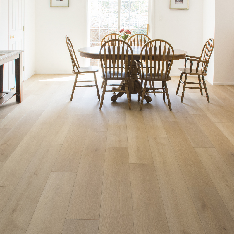 Tecsun Grandeur Collection Luxury Vinyl Plank in the color Erie Canal. Dining room installation.